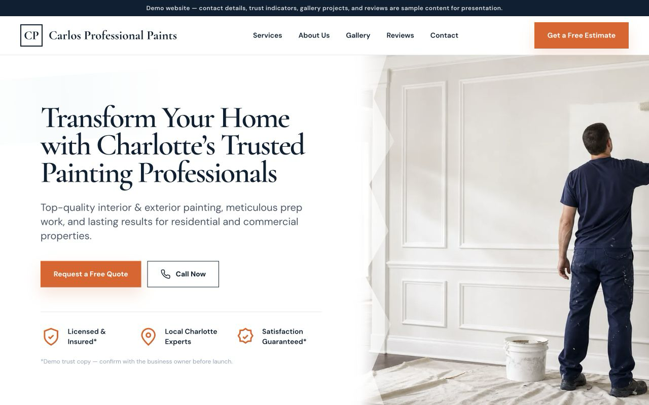 Carlos Professional Paints homepage with a painter working in a bright room